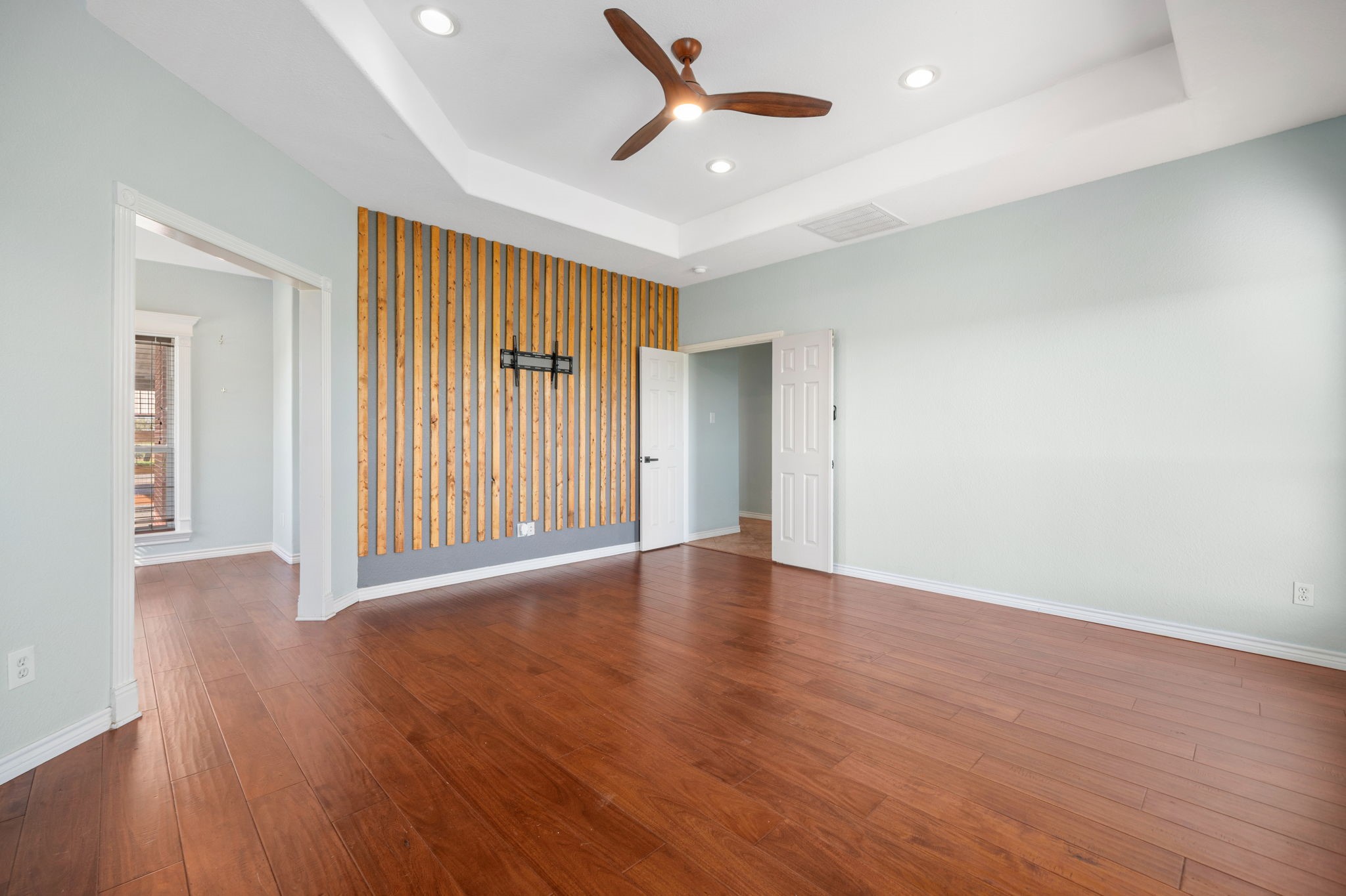 7740 Farm To Market 1462 Rosharon, TX 77583 - Photo 14 of 35 an empty room with wooden floor and windows