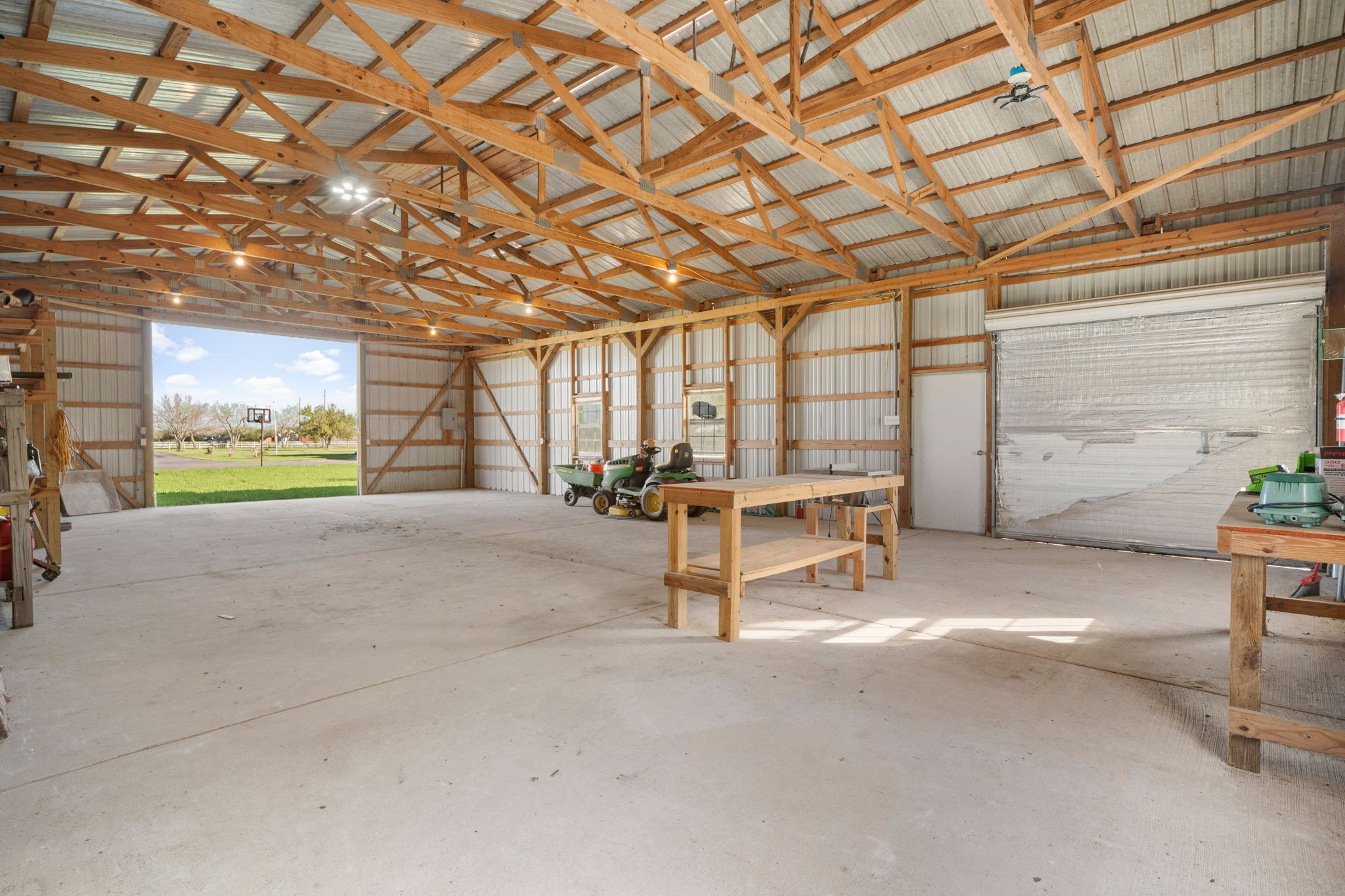 7740 Farm To Market 1462 Rosharon, TX 77583 - Photo 28 of 35 a view of a room with gym equipment