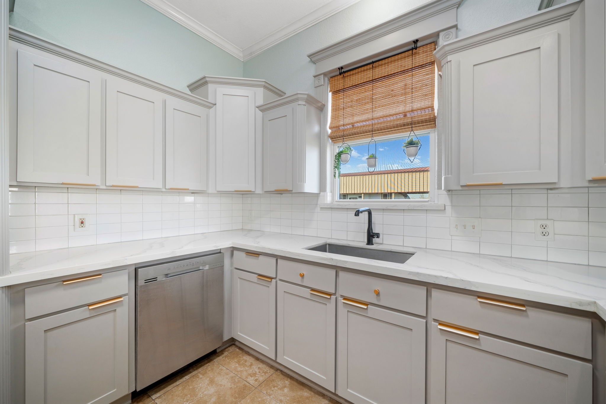 7740 Farm To Market 1462 Rosharon, TX 77583 - Photo 10 of 35 a kitchen with white cabinets and white appliances