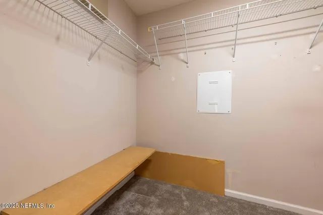 a view of a room with racks on the wall