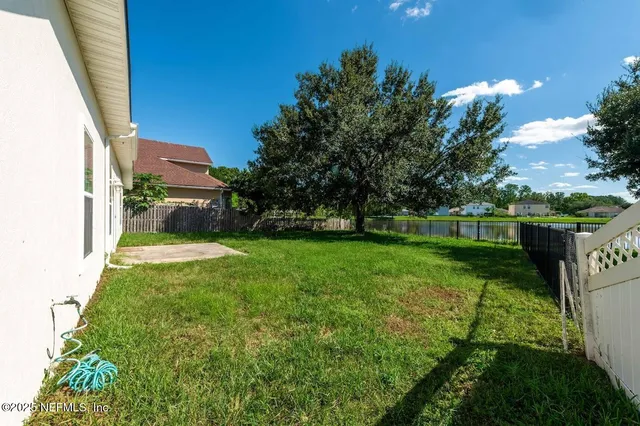 a sign broad in front of a brick building