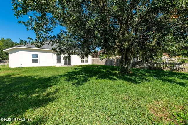 a house view with a garden space