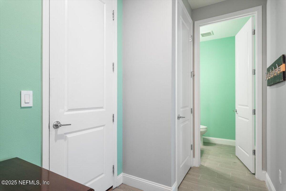 16 Samantha Court St. Augustine, FL 32092 - Photo 17 of 52 Hallway to 1/2 bath and Laundry room