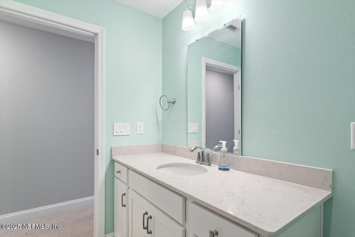 16 Samantha Court St. Augustine, FL 32092 - Photo 38 of 52 Great vanity space in guest bathroom