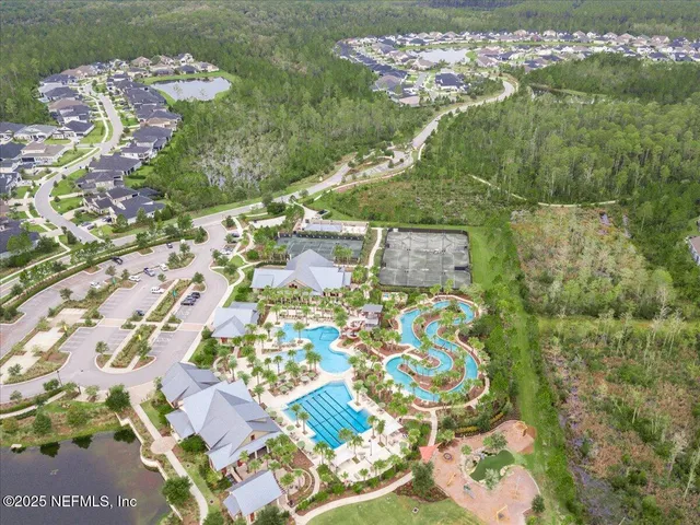 a view of a park with large trees