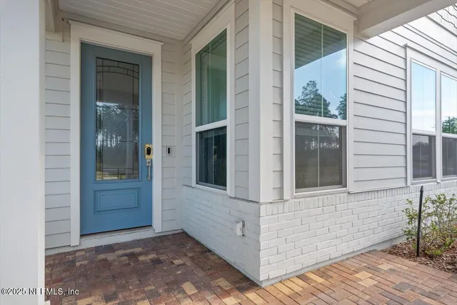 front view of a house with a glass door