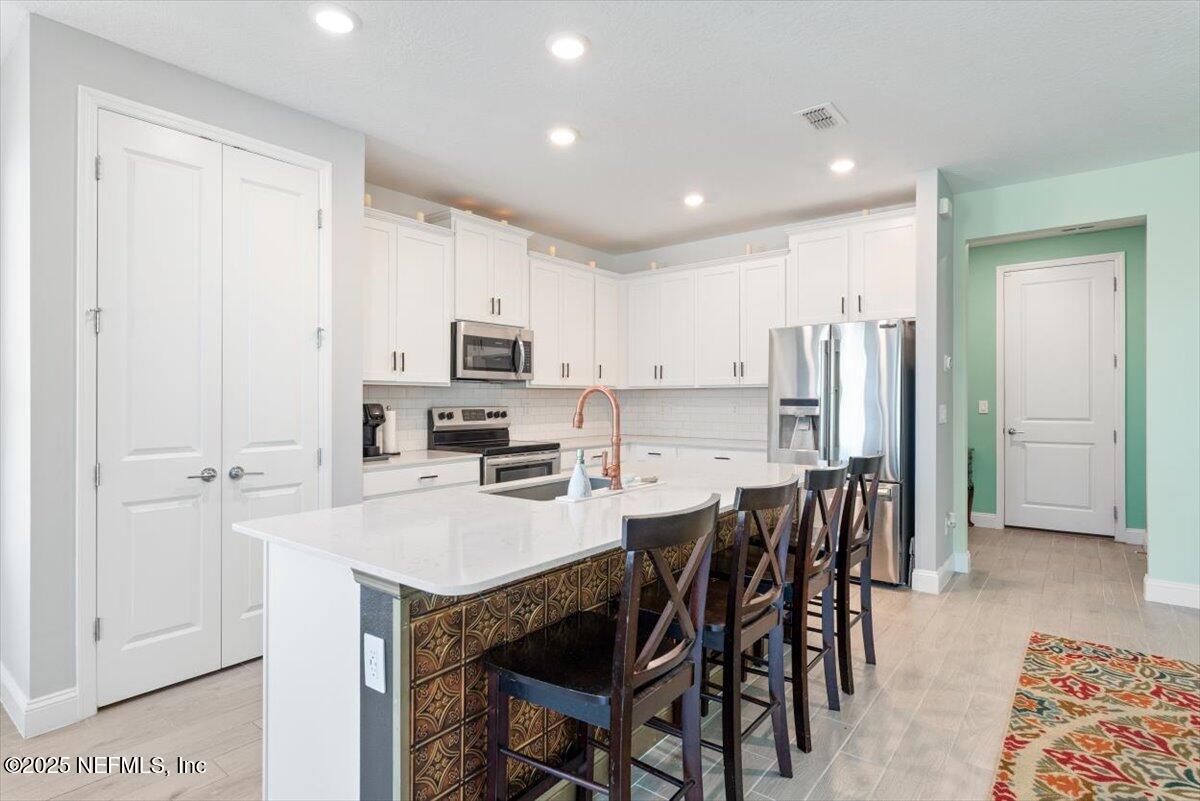 16 Samantha Court St. Augustine, FL 32092 - Photo 9 of 52 Kitchen Island with ample seating