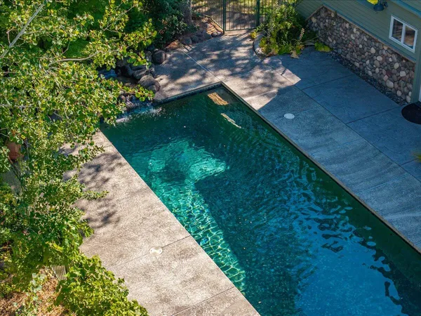a backyard of a house with lots of green space