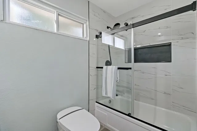 a view of a backyard with trees