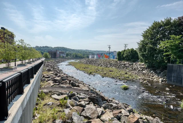 a view of a terrace with wooden fence