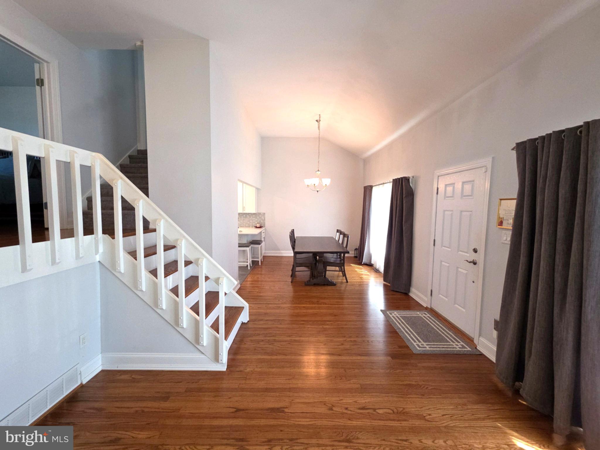 156 Crockett Road Warminster, PA 18974 - Photo 12 of 57 a view of an entryway with wooden floor and a livingroom view