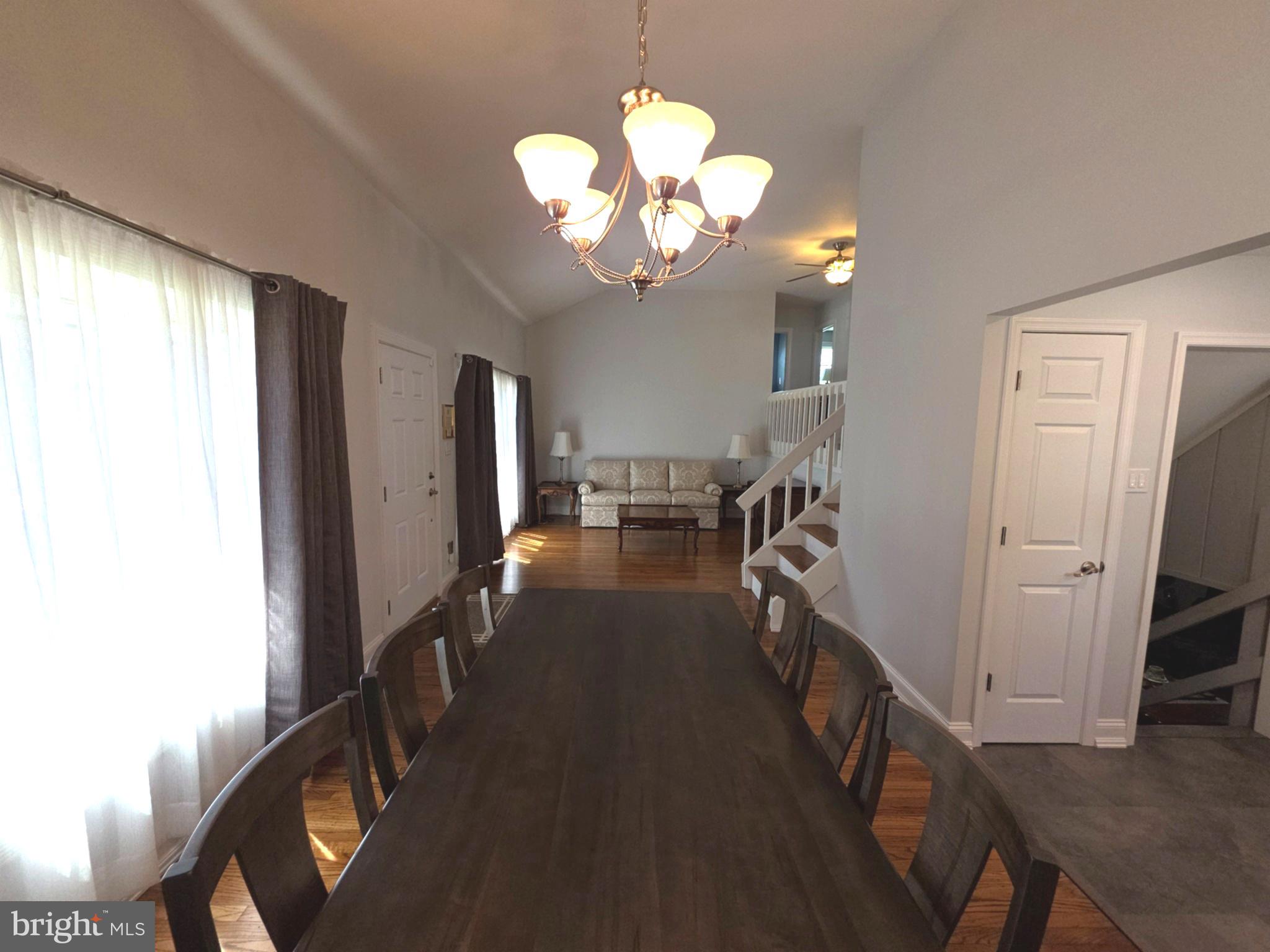 156 Crockett Road Warminster, PA 18974 - Photo 15 of 57 a view of a livingroom with a chandelier