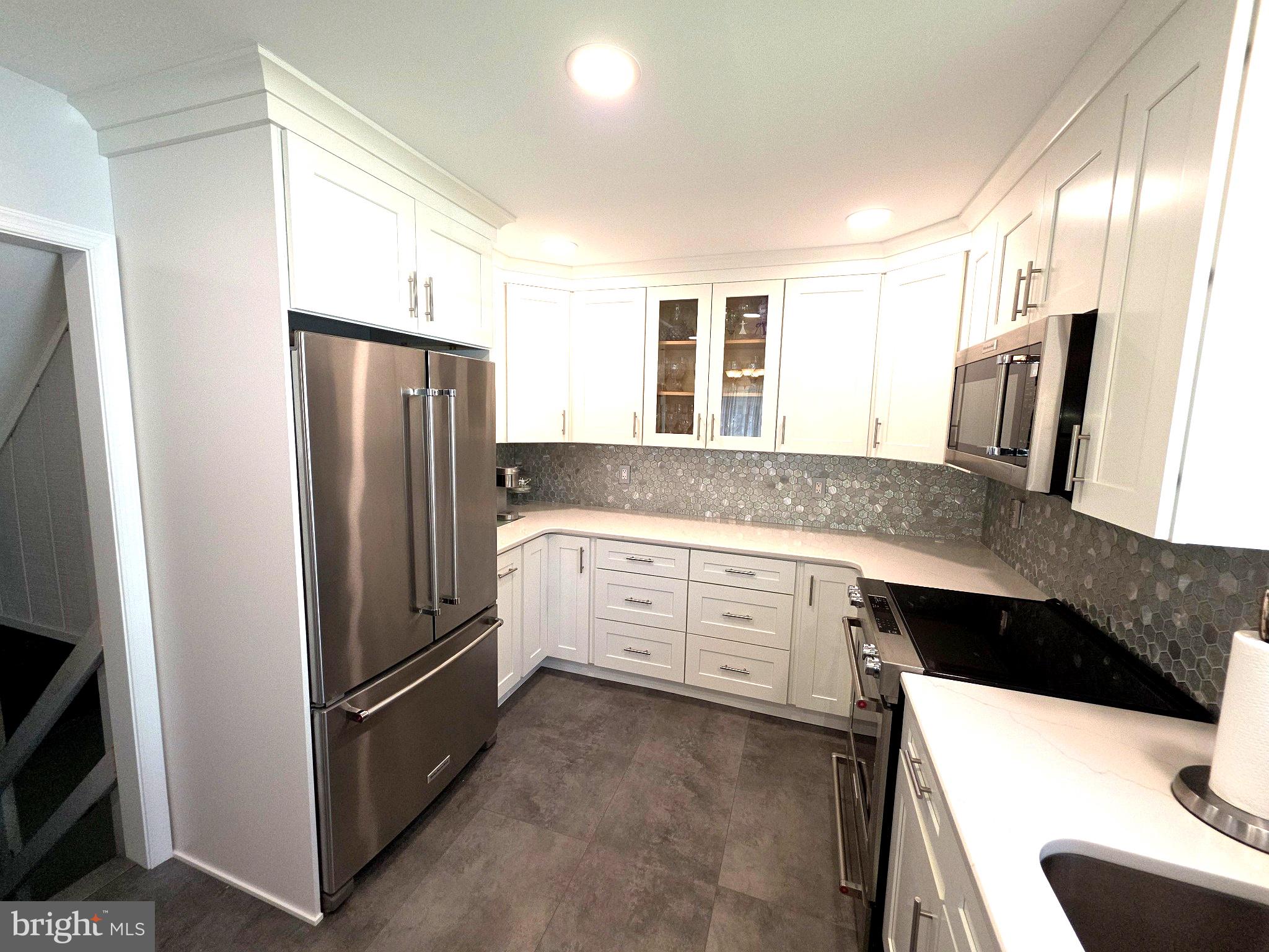 156 Crockett Road Warminster, PA 18974 - Photo 26 of 57 a kitchen with a refrigerator and a sink