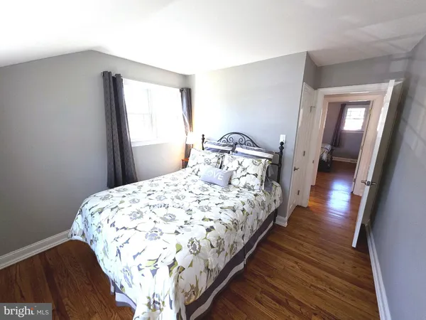 a view of a kitchen from the hallway