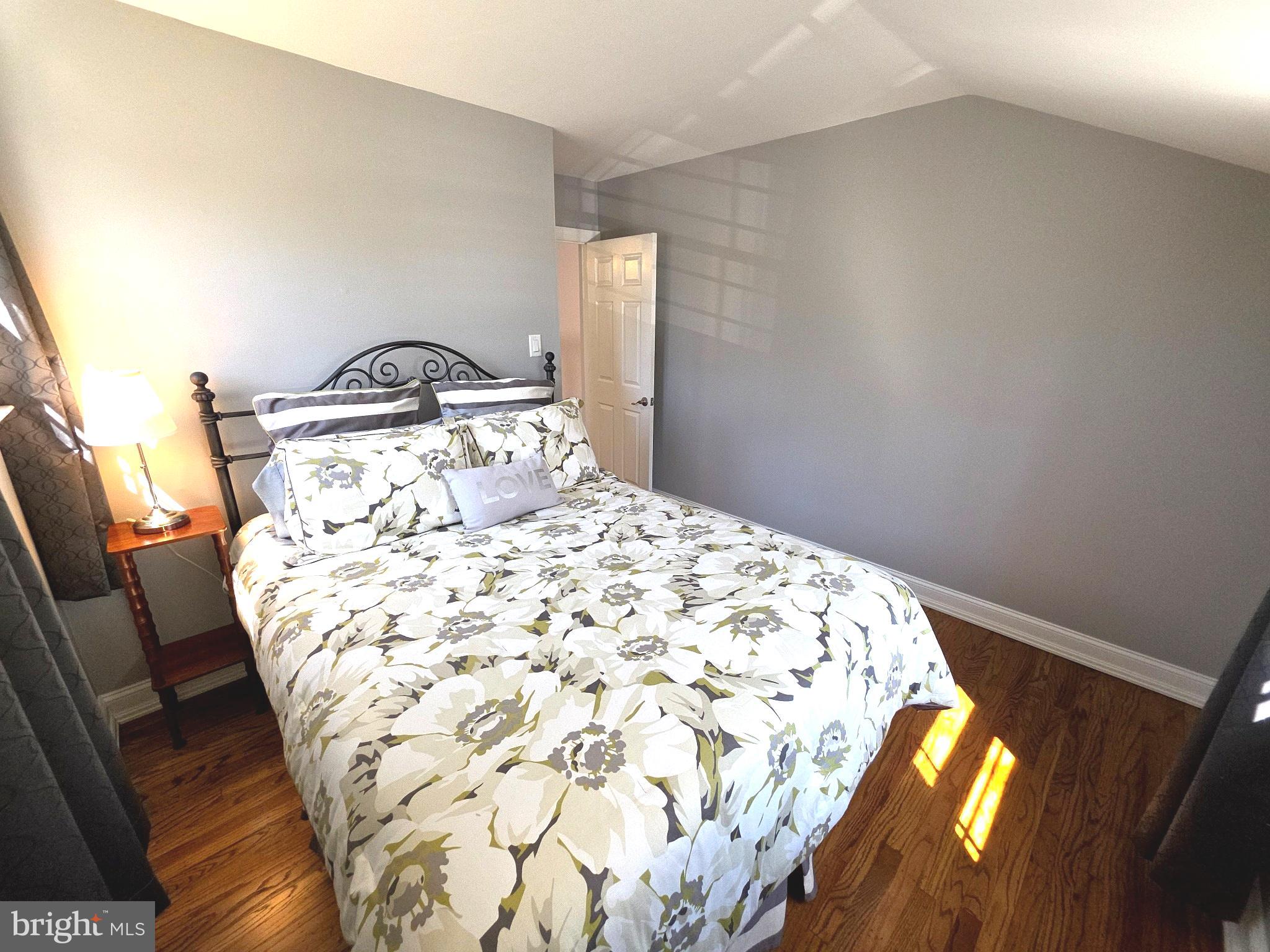 156 Crockett Road Warminster, PA 18974 - Photo 44 of 57 a bedroom with a bed and a dresser