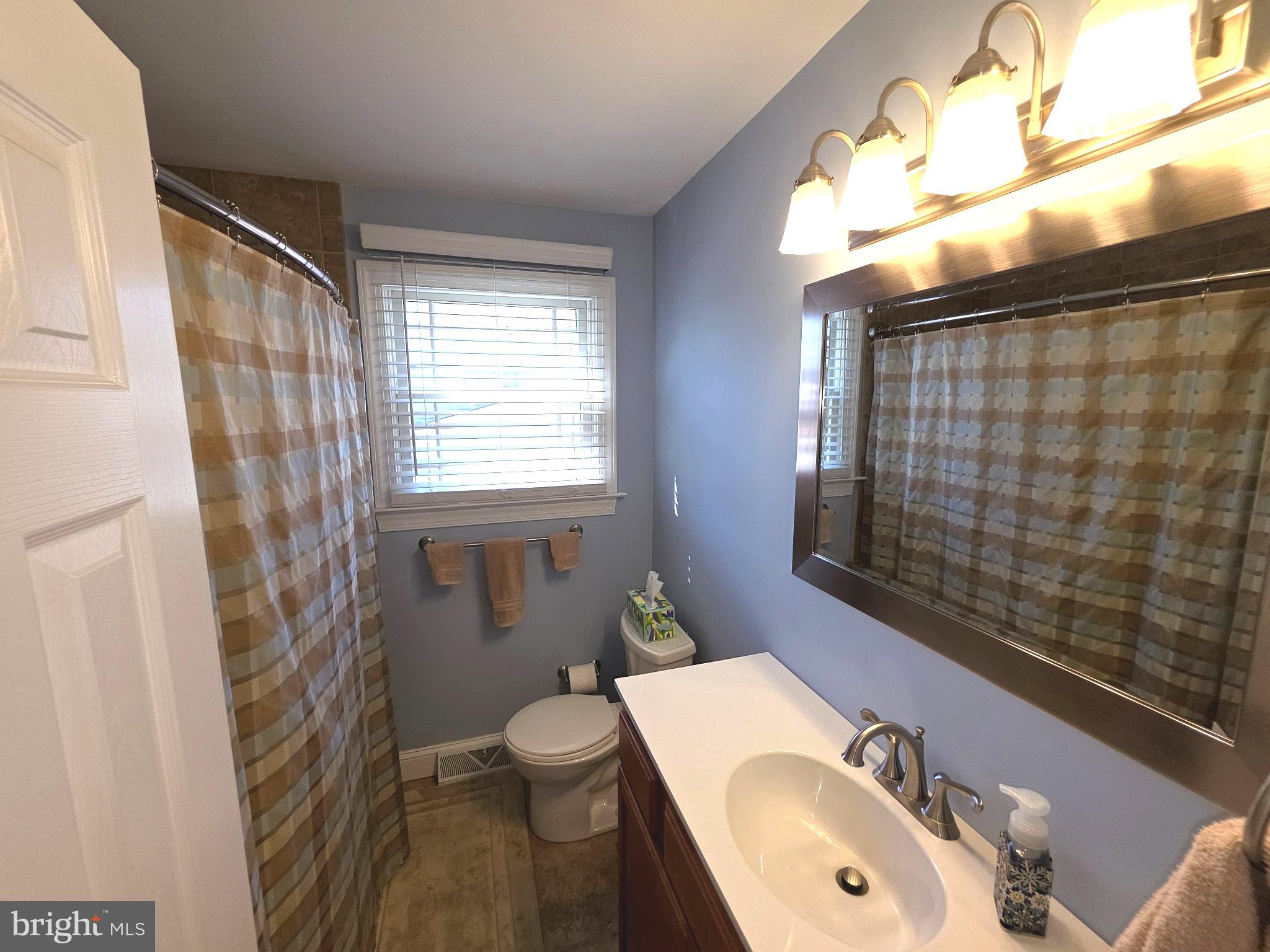 156 Crockett Road Warminster, PA 18974 - Photo 49 of 57 a bathroom with a sink a toilet and shower