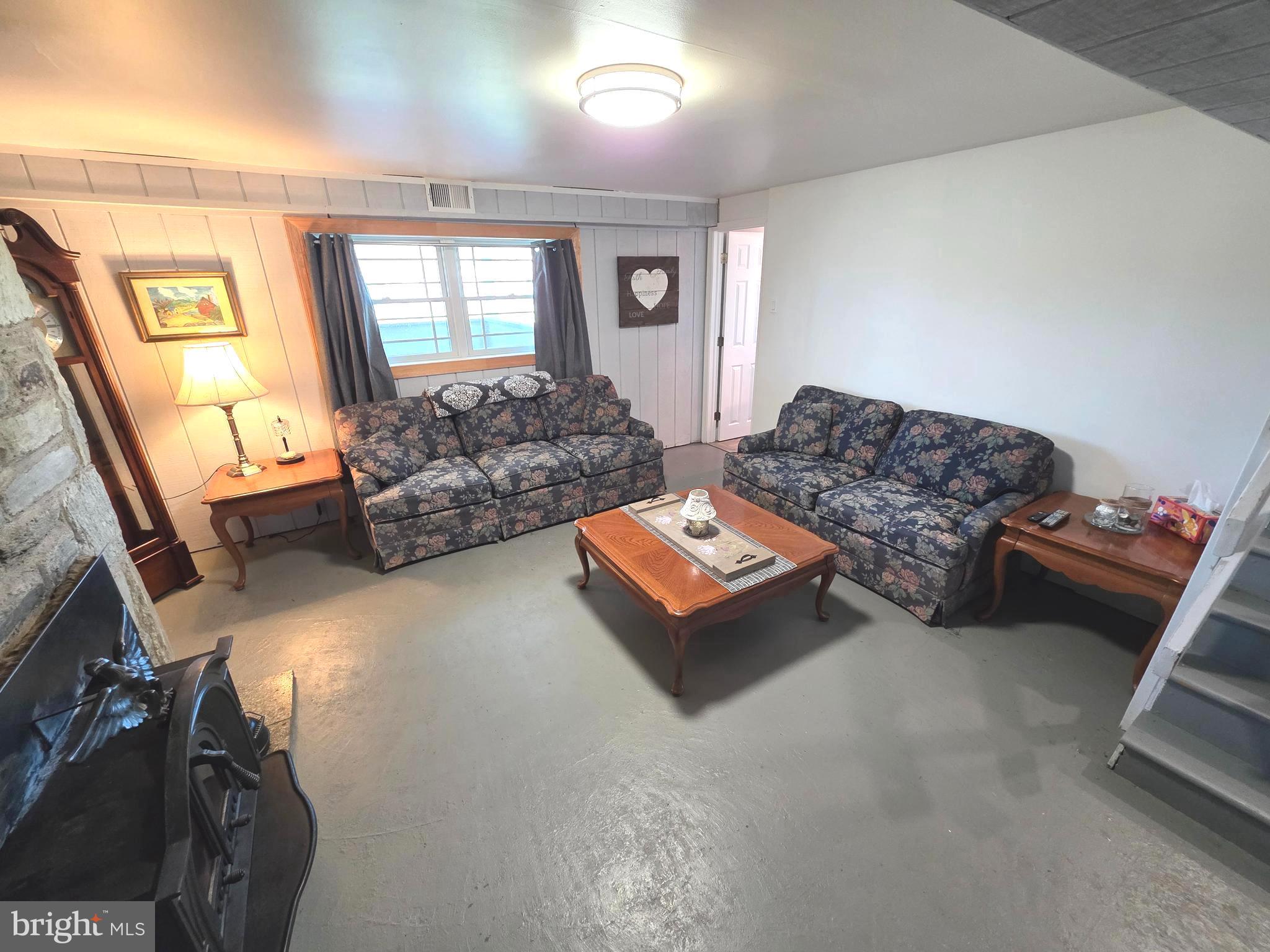 156 Crockett Road Warminster, PA 18974 - Photo 52 of 57 a living room with furniture and a window