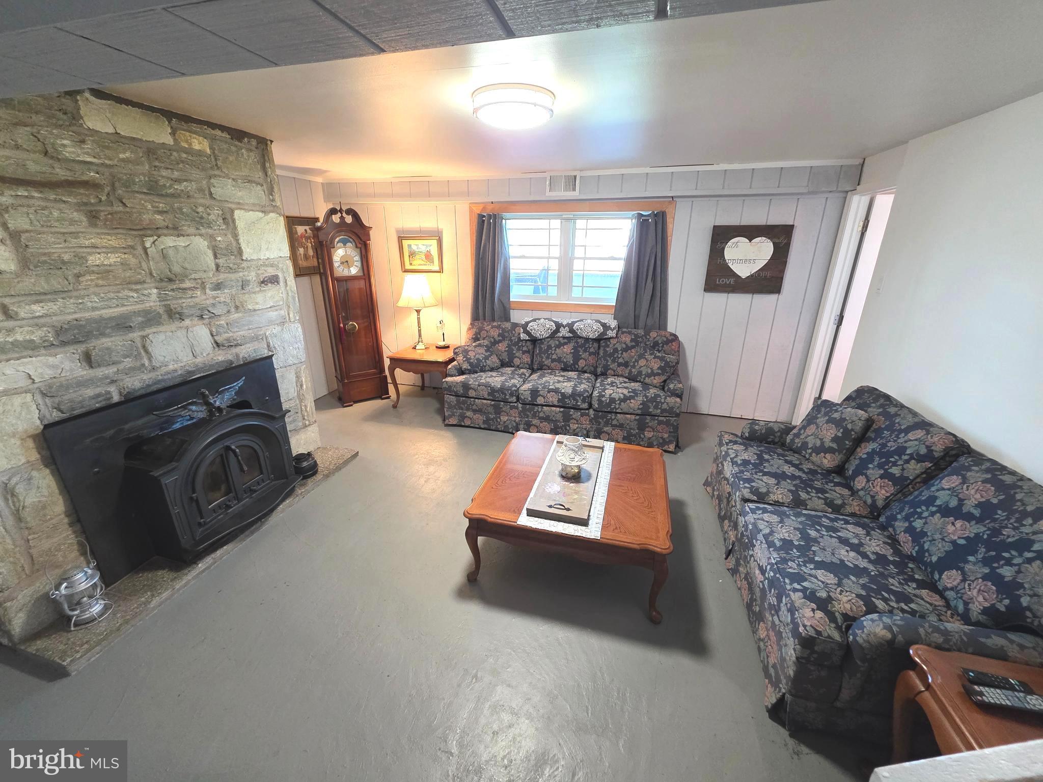 156 Crockett Road Warminster, PA 18974 - Photo 53 of 57 a living room with furniture and a fireplace
