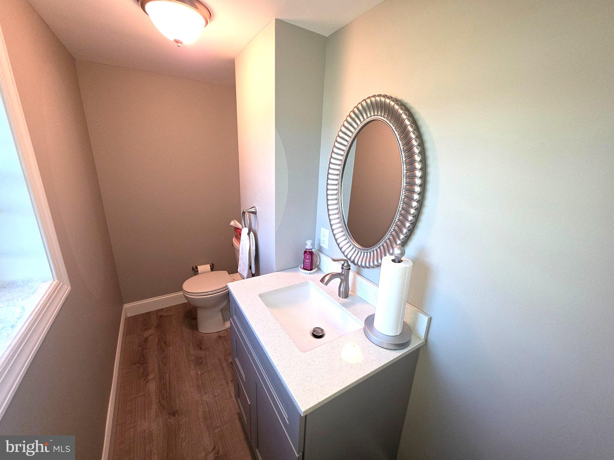 156 Crockett Road Warminster, PA 18974 - Photo 54 of 57 a bathroom with a sink and a mirror