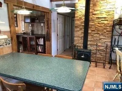 a view of a living room and bathroom