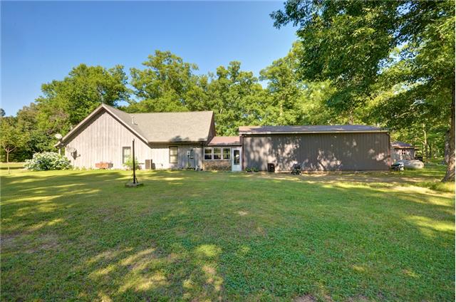 60 Fairview School Road Normandy, TN 37360 - Photo 3 of 20 BACK OF HOUSE WITH BREEZEWAY THAT ACTS AS SCREENED PORCH THAT CONNECTS TO THE 30X40 WORKSHOP.