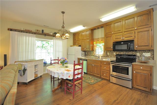 60 Fairview School Road Normandy, TN 37360 - Photo 9 of 20 GRANITE COUNTERTOPS, TILE BACK SPLASH IN KITCHEN THAT OPENS TO SITTING AREA