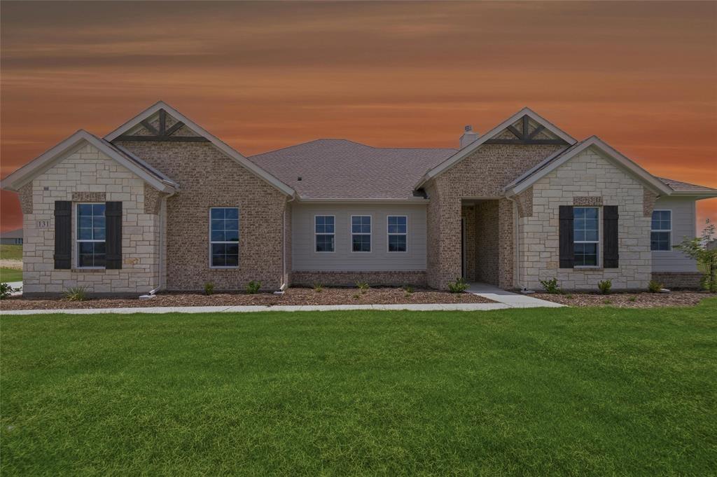 131 Big Sky Road Decatur, TX 76234 - Photo 4 of 23 Stone and brick exterior with a gabled roof