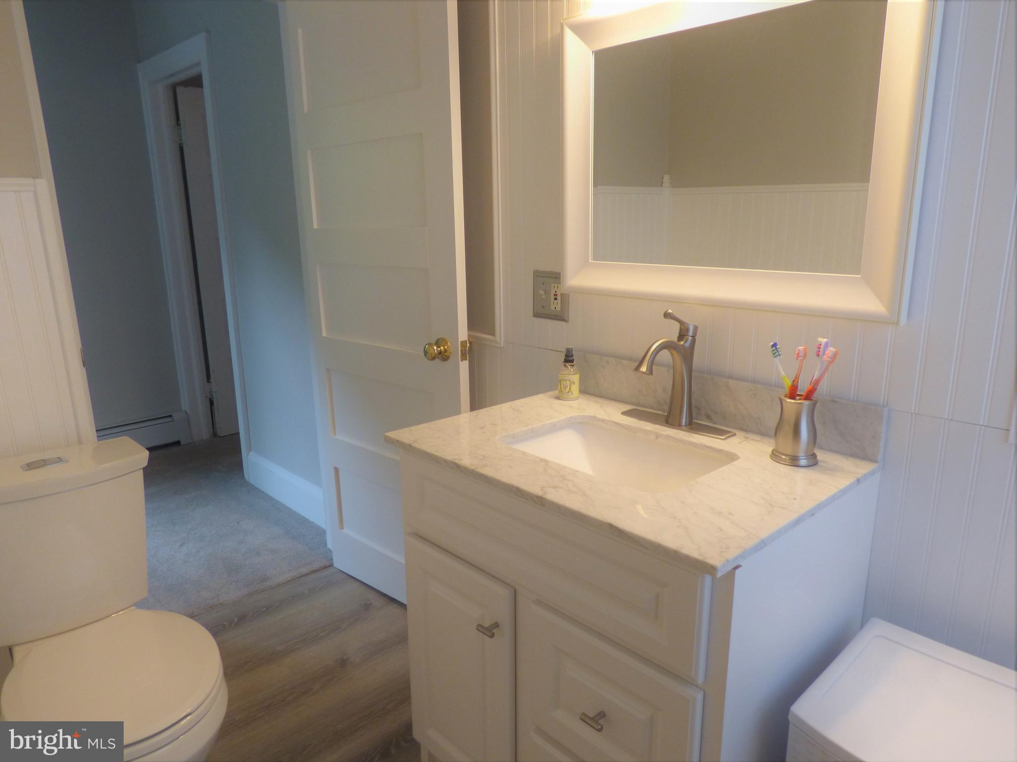235 Reid Road Coatesville, PA 19320 - Photo 26 of 32 2nd floor updated full bathroom