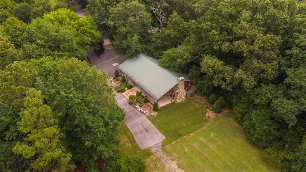 565 Owens Gin Road Northeast Calhoun, GA 30701 - Photo 14 of 80 an aerial view of a house with a yard