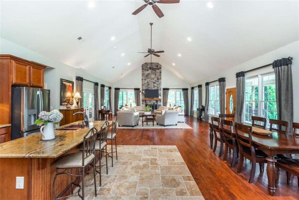 565 Owens Gin Road Northeast Calhoun, GA 30701 - Photo 34 of 80 a view of a dining room with furniture window and outside view