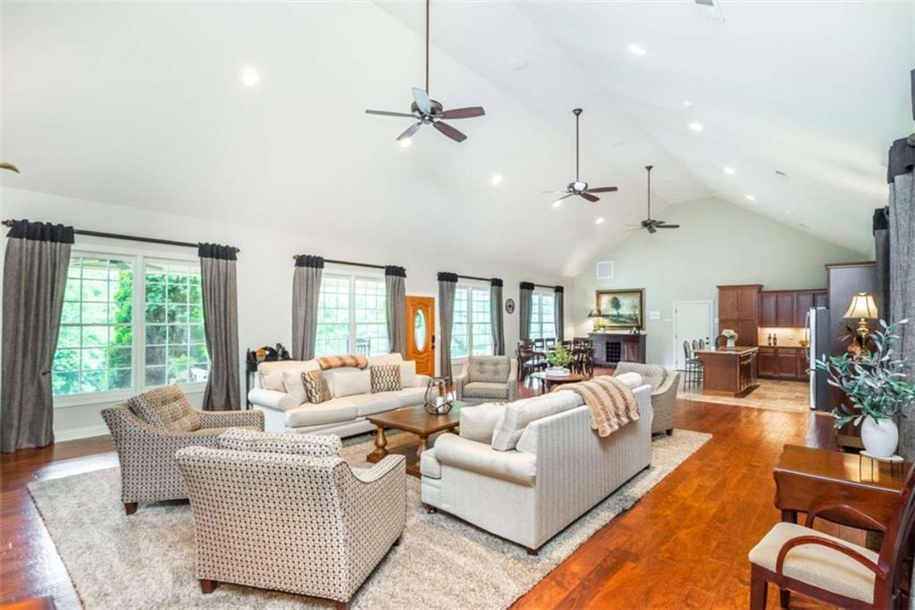 565 Owens Gin Road Northeast Calhoun, GA 30701 - Photo 42 of 80 a living room with furniture and a large window
