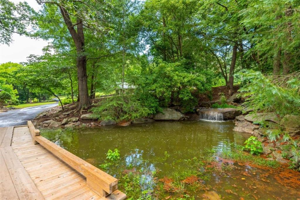 565 Owens Gin Road Northeast Calhoun, GA 30701 - Photo 69 of 80 a view of a lake view with a large trees