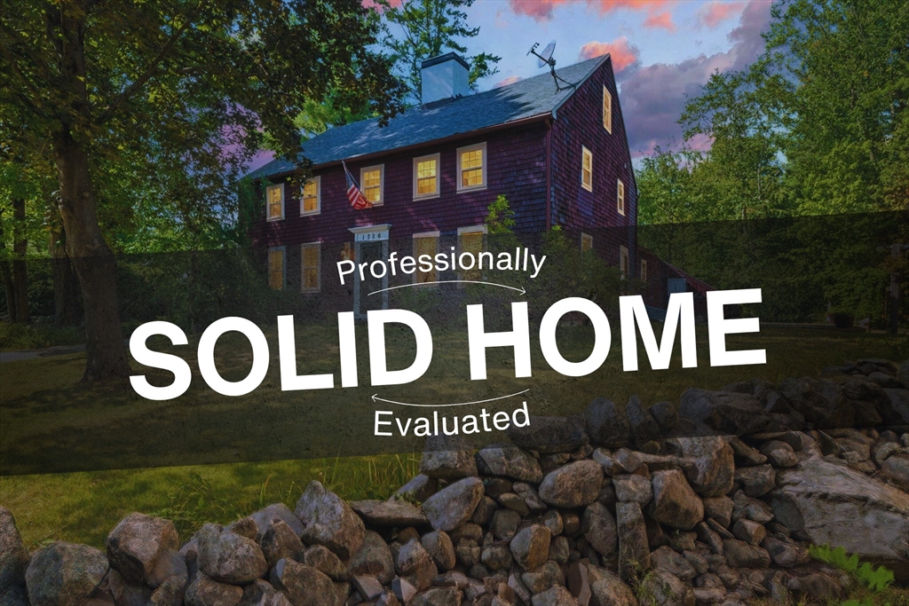 a sign that is on the side of a building