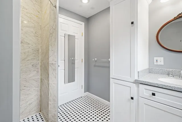 a view of a room with wooden floor and closet