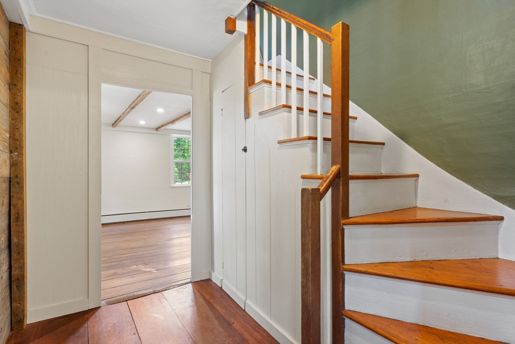 132 Maple Avenue Atkinson, NH 03811 - Photo 20 of 41 a view of entryway with wooden floor