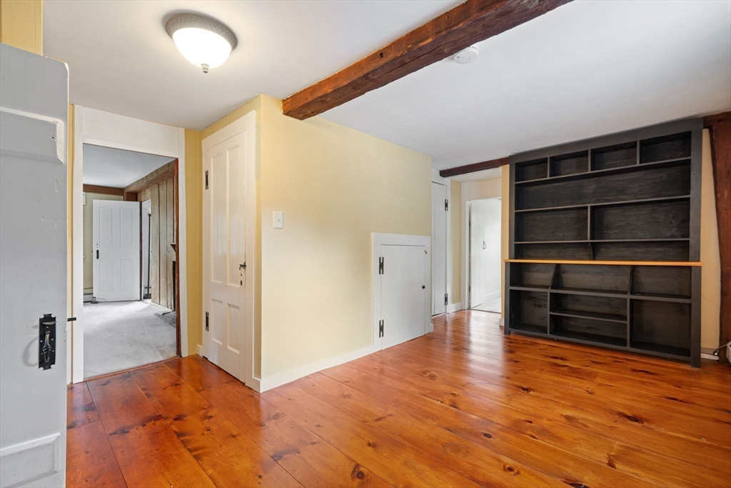 132 Maple Avenue Atkinson, NH 03811 - Photo 21 of 41 a view of a room with wooden floor and closet