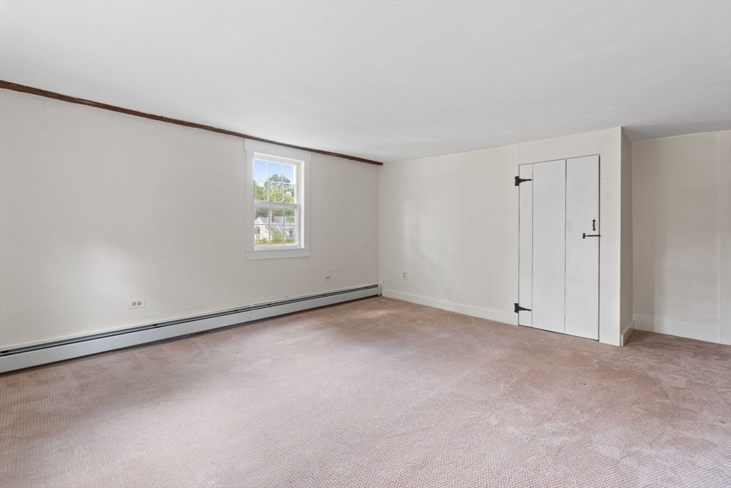132 Maple Avenue Atkinson, NH 03811 - Photo 25 of 41 an empty room with windows