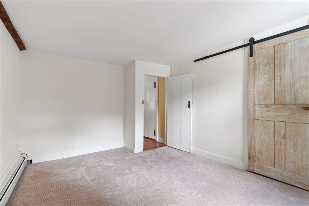 132 Maple Avenue Atkinson, NH 03811 - Photo 27 of 41 a view of an empty room