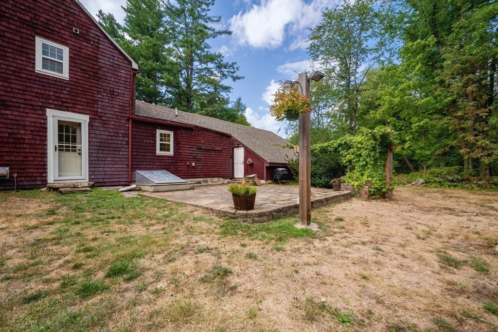 132 Maple Avenue Atkinson, NH 03811 - Photo 36 of 41 a house view with a backyard space
