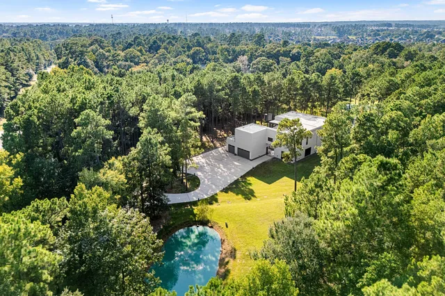 a view of a houses with a lake view