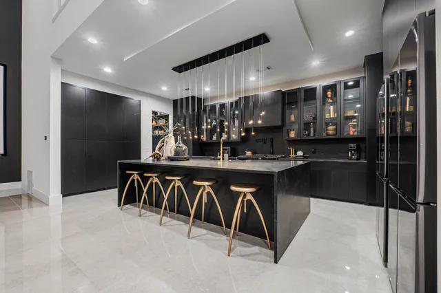 a living room with furniture a ceiling fan and a rug