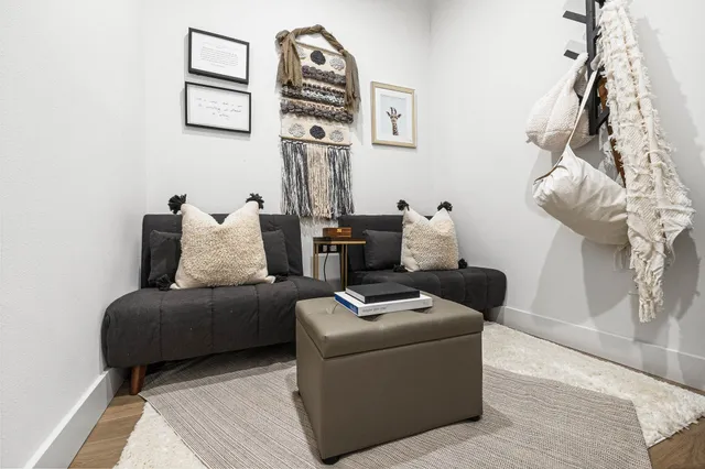 a view of storage and utility room with two washing machine