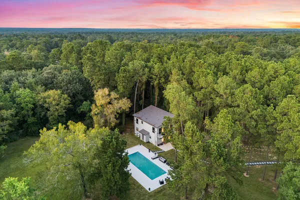 a table with chairs and a stove