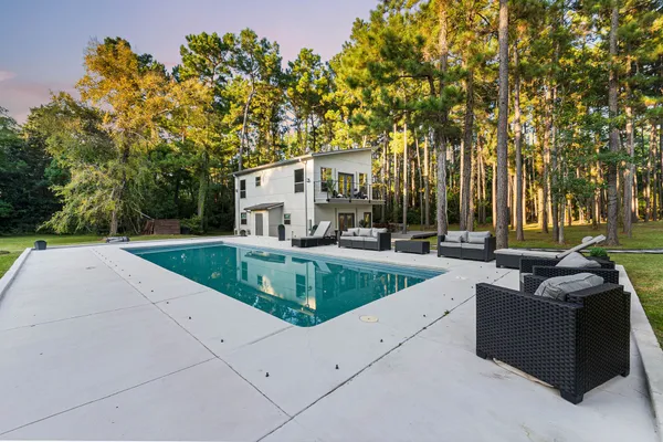 a view of swimming pool with patio