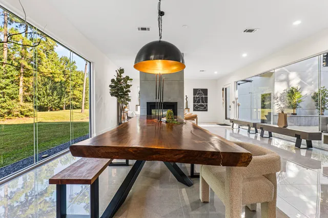 a kitchen with stainless steel appliances granite countertop a sink and a stove