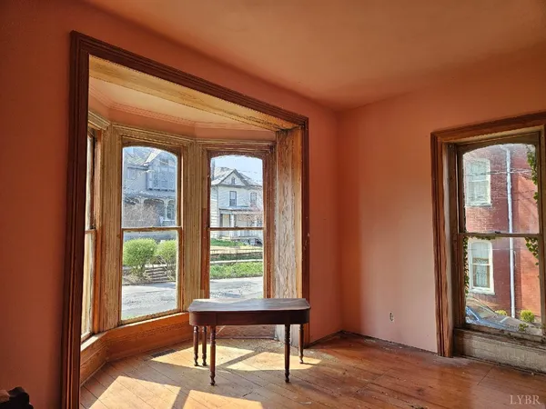 a view of a livingroom with furniture and window