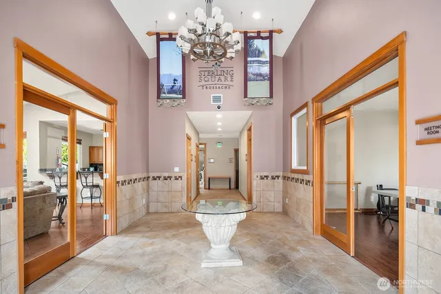 a bathroom with a sink toilet and a shower