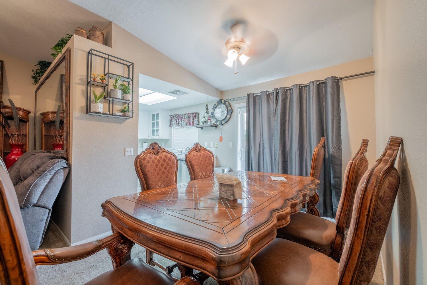 44628 Shadowcrest Drive Lancaster, CA 93536 - Photo 6 of 23 a view of a dining room with furniture and chandelier