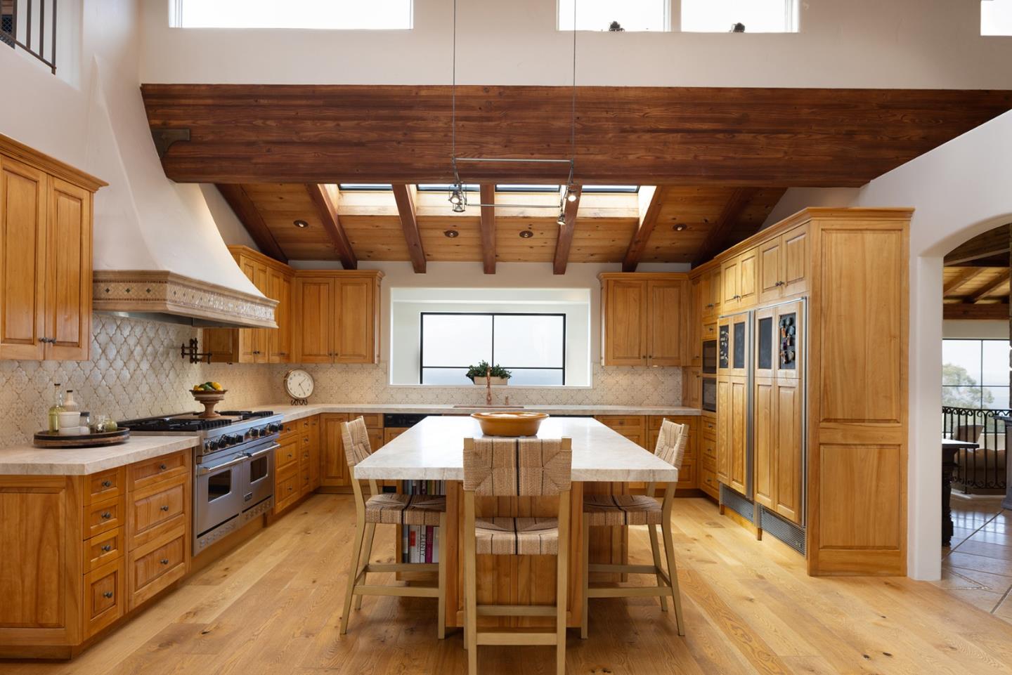 31453 Highway 1 Carmel, CA 93923 - Photo 13 of 58 a kitchen with stainless steel appliances a stove a sink dishwasher and cabinets