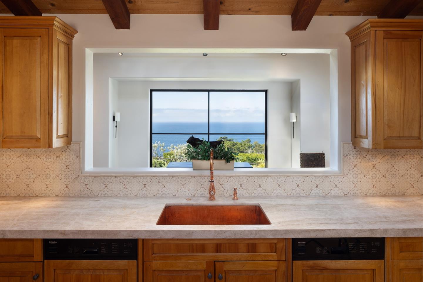 31453 Highway 1 Carmel, CA 93923 - Photo 14 of 58 a kitchen with a sink and a window